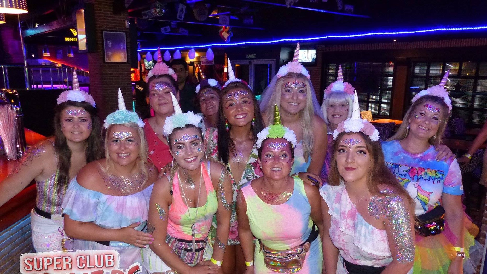 Hen group in unicorn costumes at Benidorm fiestas